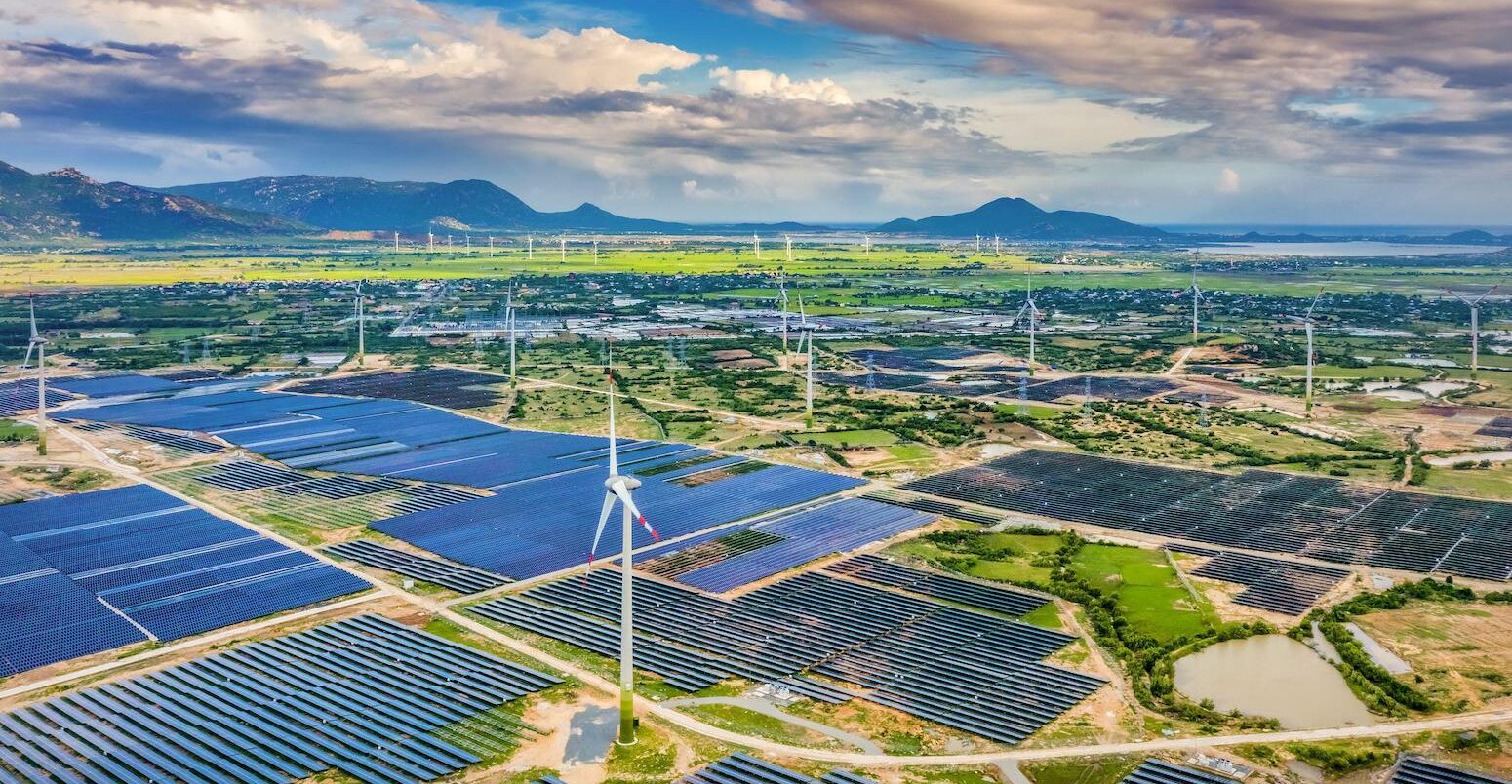Aerial view of solar panels and wind turbines in Vietnam. Credit: Quang Ngoc Nguyen / Alamy Stock Photo