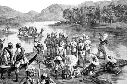 Illustration depicting British troops being ferried across a river in Burma on rafts, dated 19th century. Image ID: HHEERK.