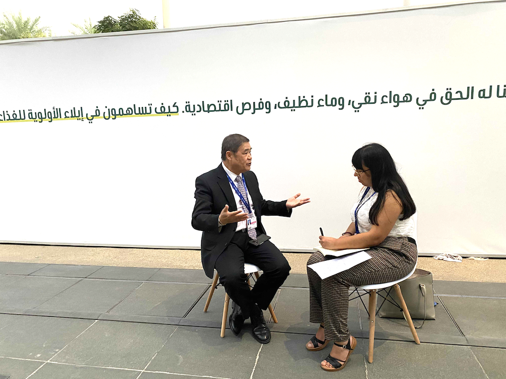 Prof. Pan Jiahua and Anika Patel at COP28 in Dubai, UAE.